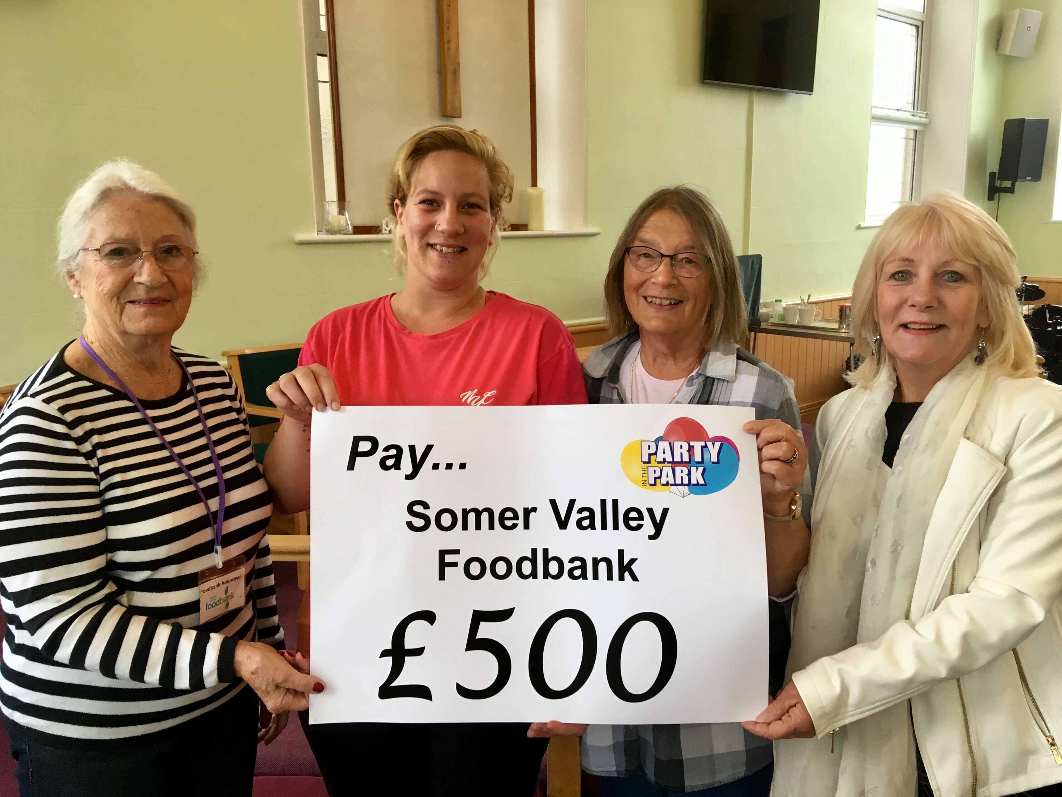 Peasedown festival thanks Somer Valley Foodbank with £500 donation!